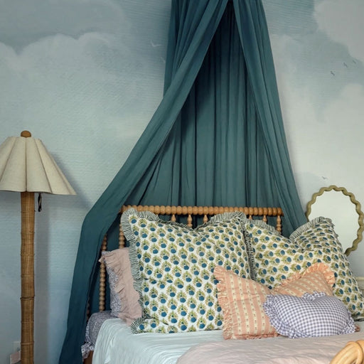 Nuage pale blue sky and white cloud peel and stick mural by Anewall styled in a nursery
